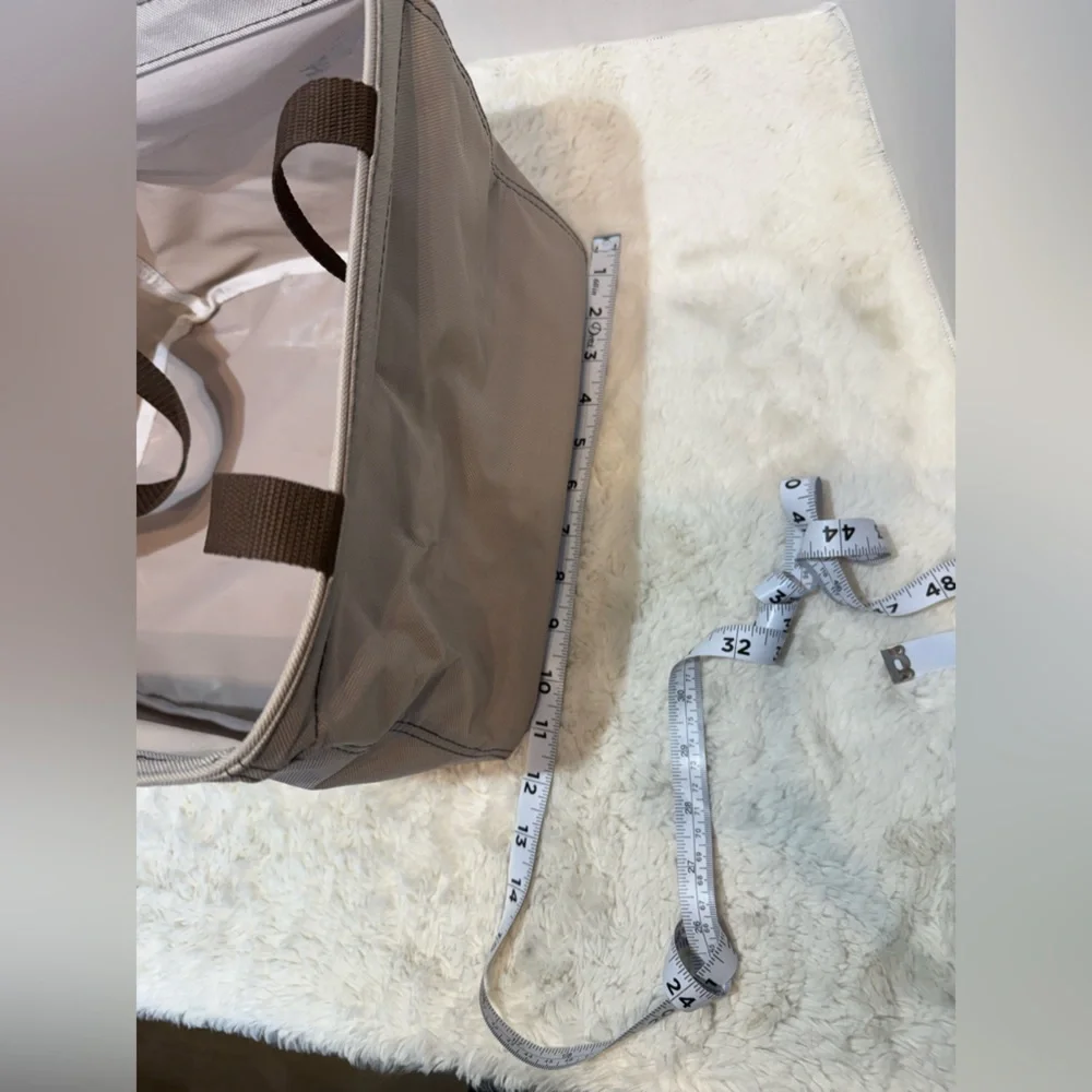 thirty-one small square beige colored tote with brown handles & blue elephant